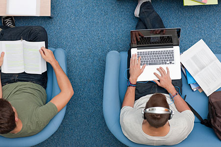 Students studying on laptop