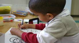 Preschool boy drawing