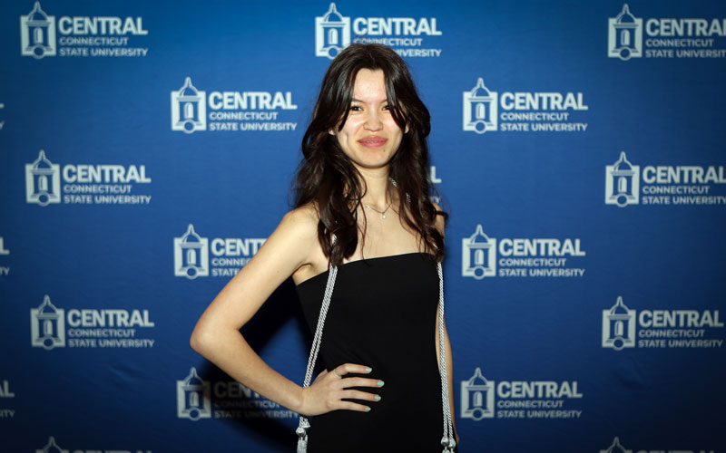 Courtney Chamberland in front of Central Backdrop