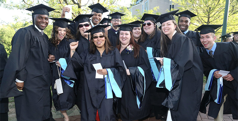 Students in Graduate Cap and Gowns