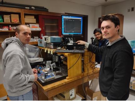 Students conducting liquid crystal experiment