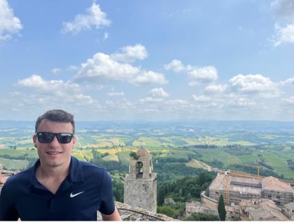 Ryan in front of Italian fields