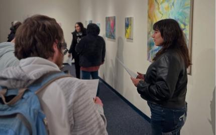 Art & Design students looking at paper