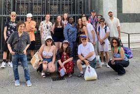 Group of students in front of gate