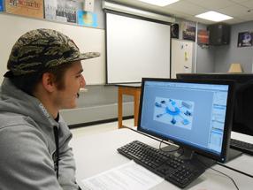 student in the premedia lab