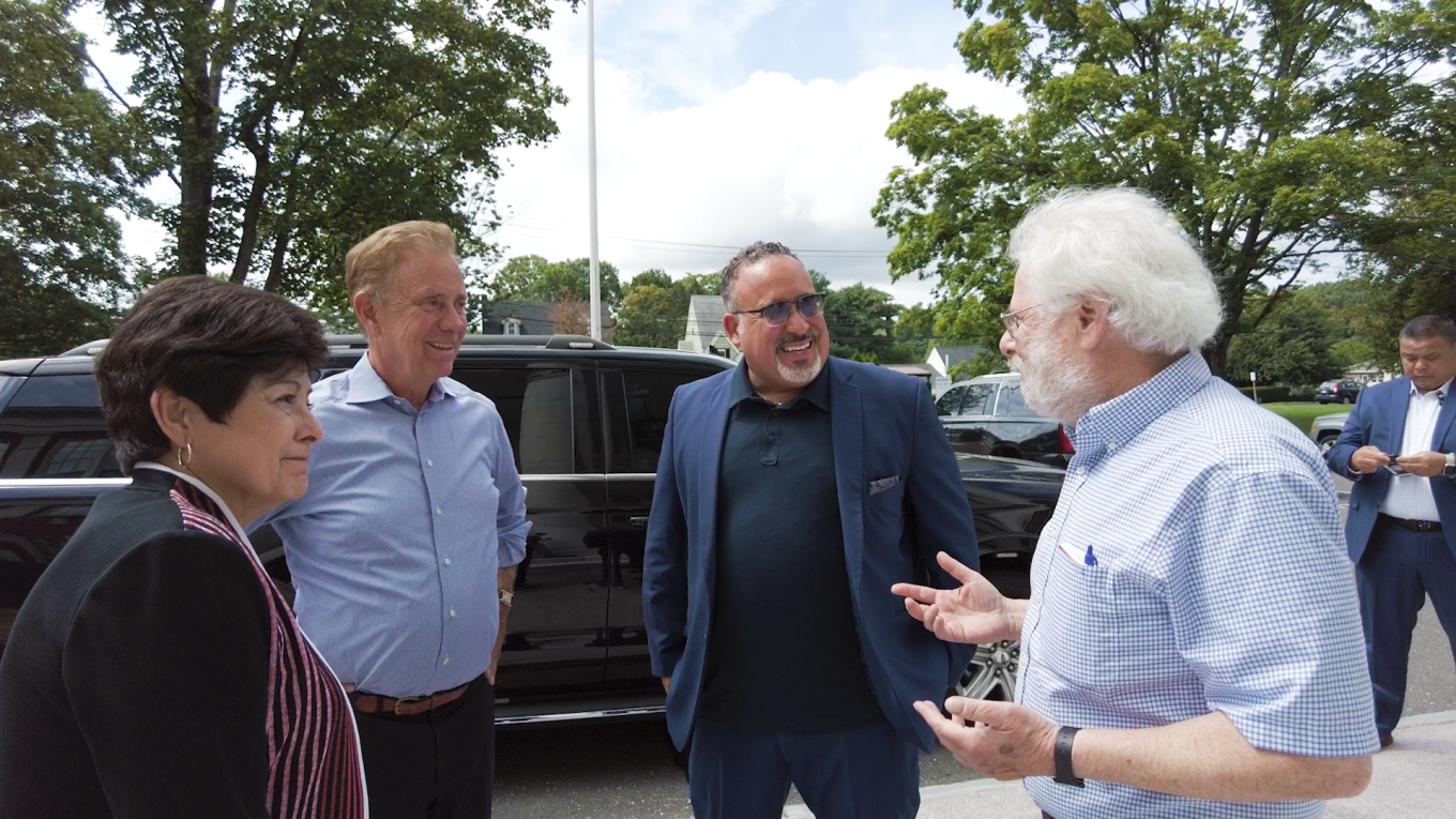 Lamont and Cardona speaking with Central Heads