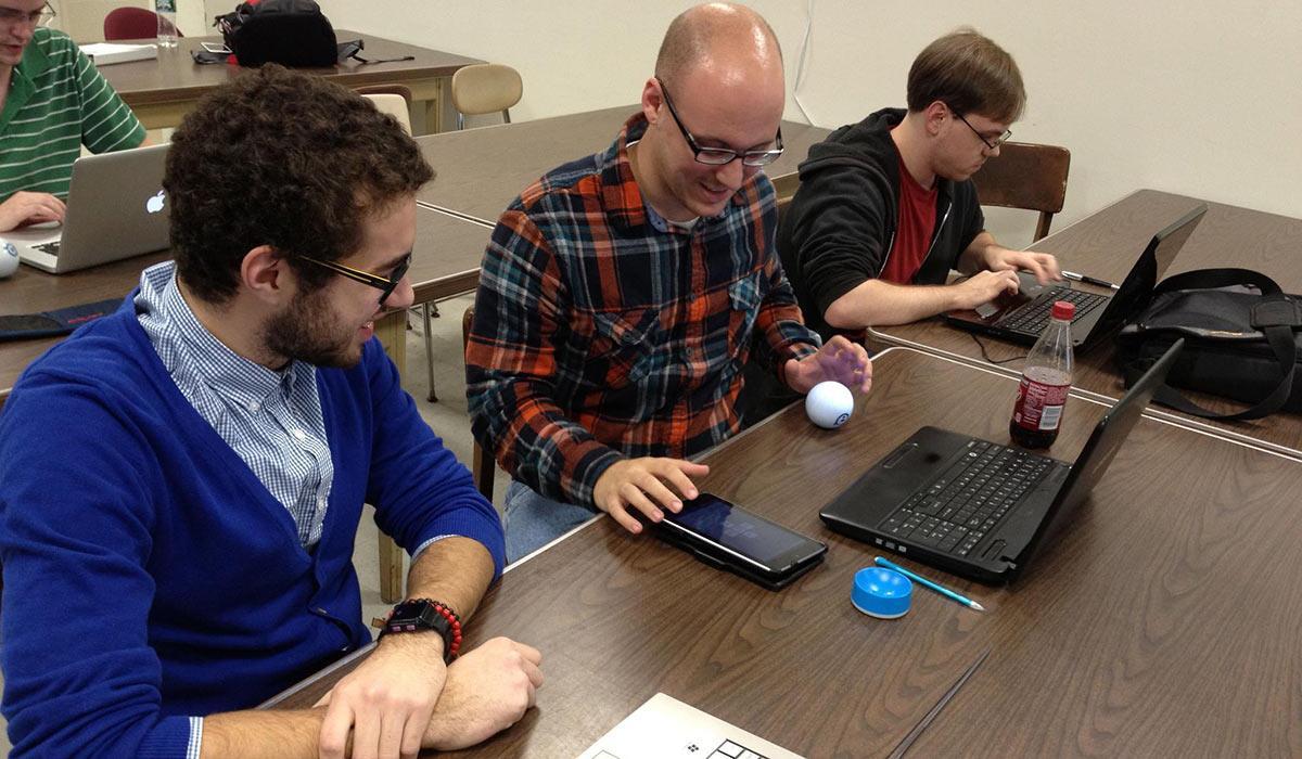 students at laptops