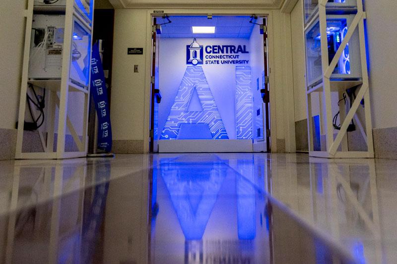 Glowing AI letters in hallway