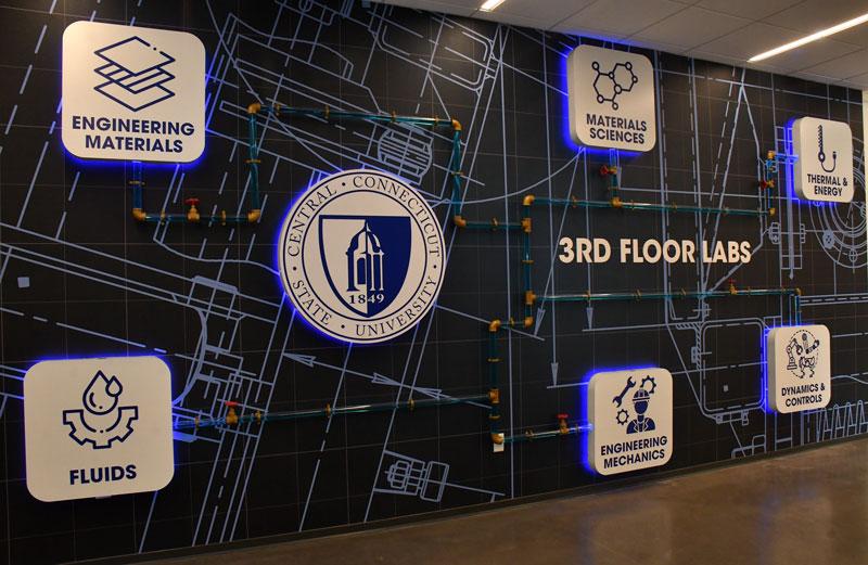 Old Central logo with different engineering properties on wall