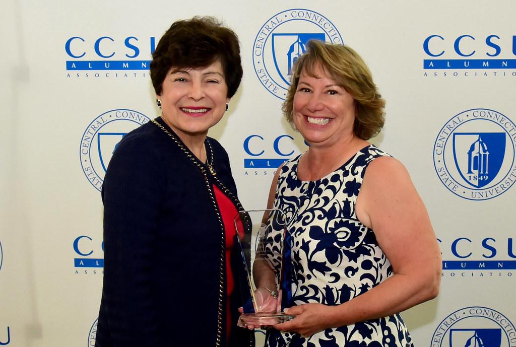 Distinguished Alumni Award winner Janet Nahorney ’83 with President Toro