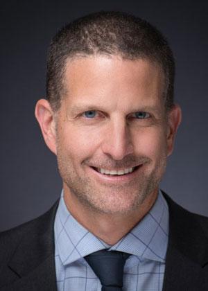 headshot of Evan Goldstein