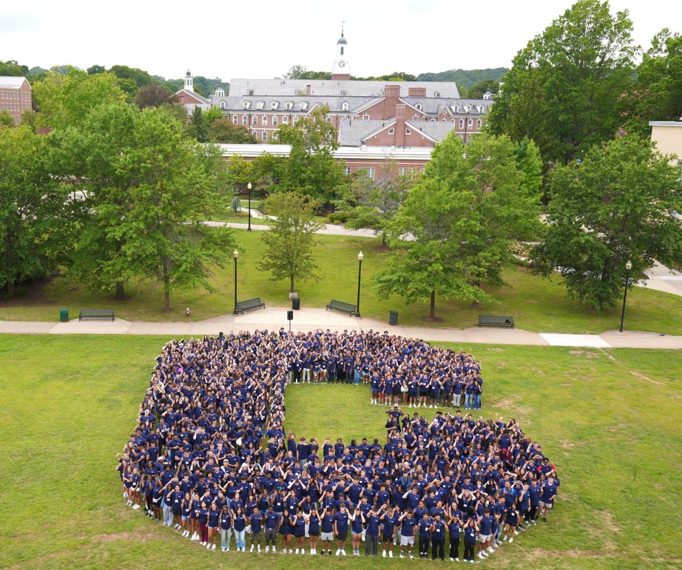 Students form the letter C on Vance lawn during Opening Day.