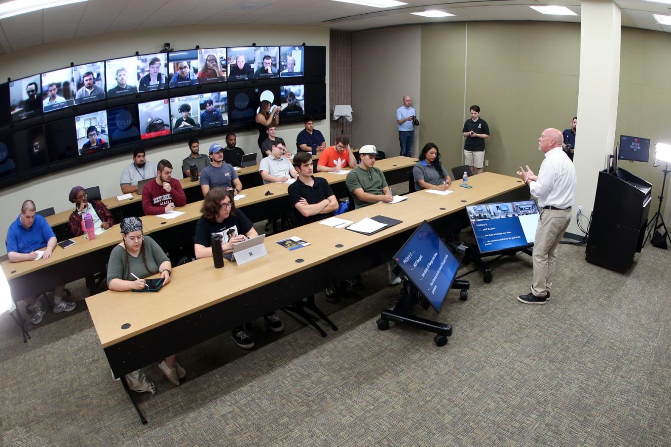 Dr. John Tully leads a lecture in Central's new Proscenium Hyflex 2.0 classroom.