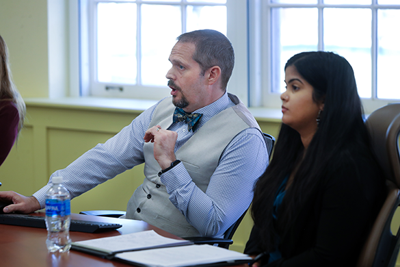 Caleb Bragg (left) and Nesha Jalaludin (right)