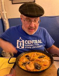 Central professor enjoying a meal in spain