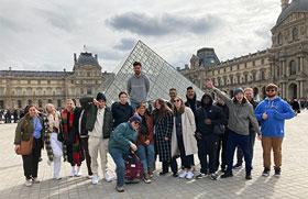Central Students on Spain trip in front of Louvre