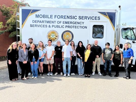 Central forensics students and faculty at the state lab
