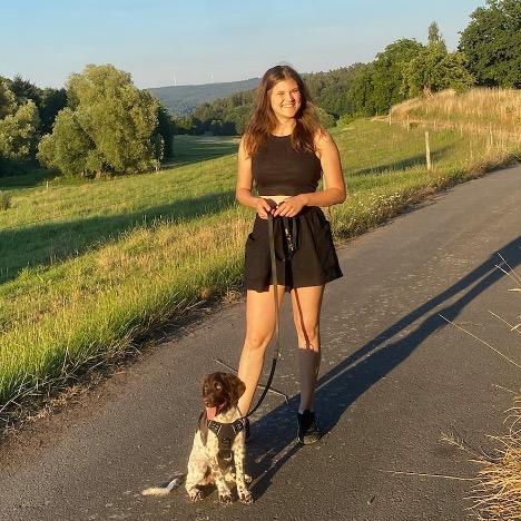 Anna On walking path with dog
