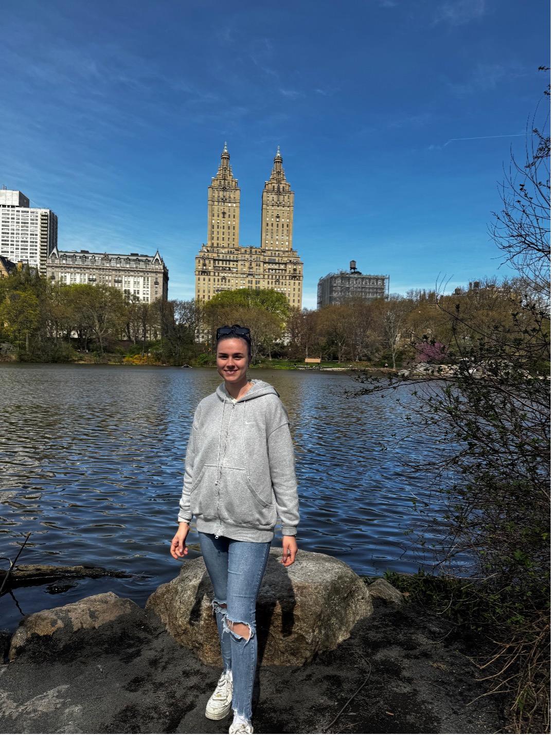 Julia Standing in Central Park in front of lake