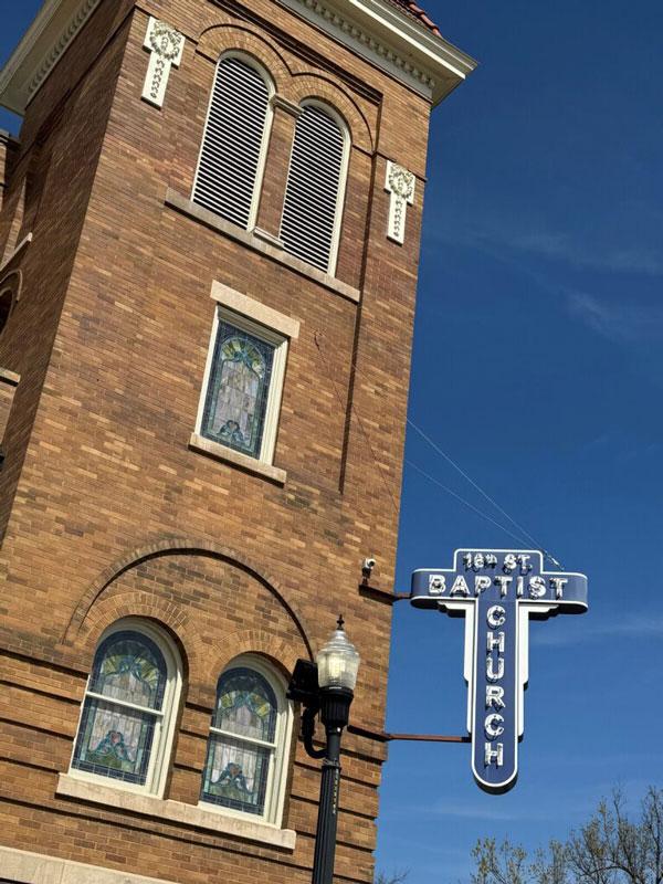 Building with sign that reads "16th Baptist Church"