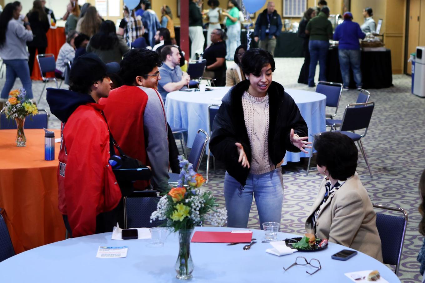 Students chat with President Toro at the annual First-Gen Celebration at Central.