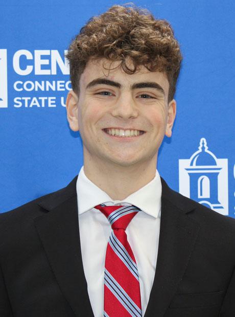 Portrait of Finlay in front of Central backdrop