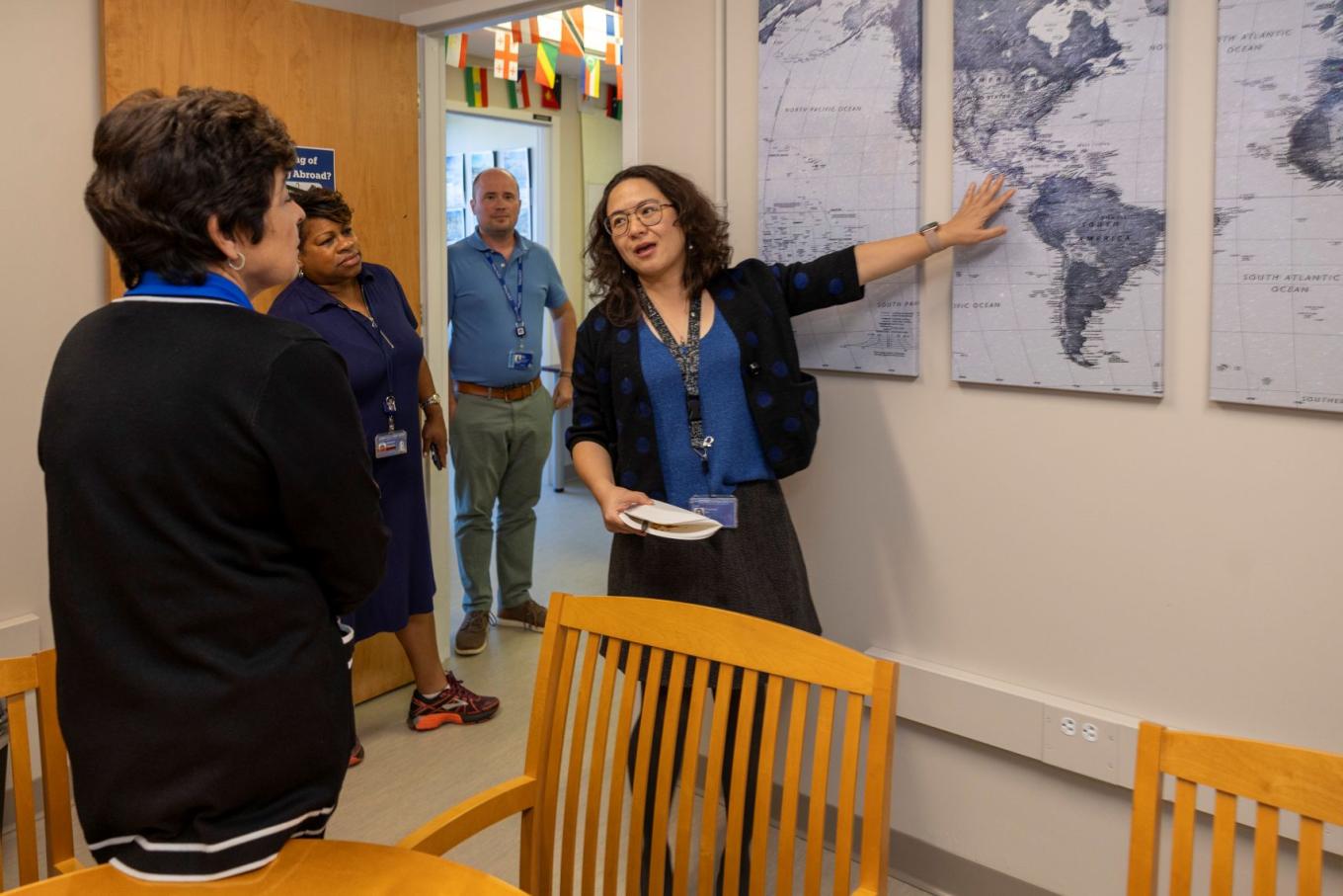 International Education Coordinator Dr. Zongxiang Mei points out new travel destinations for Central students in conversation with President Toro during an Oct. 1, 2025, Global Engagement at Central open house. (Photo by John Henninger) 
