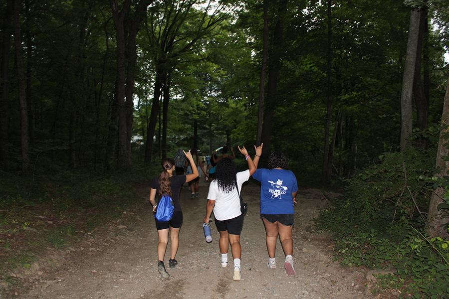 Group hike through the woods