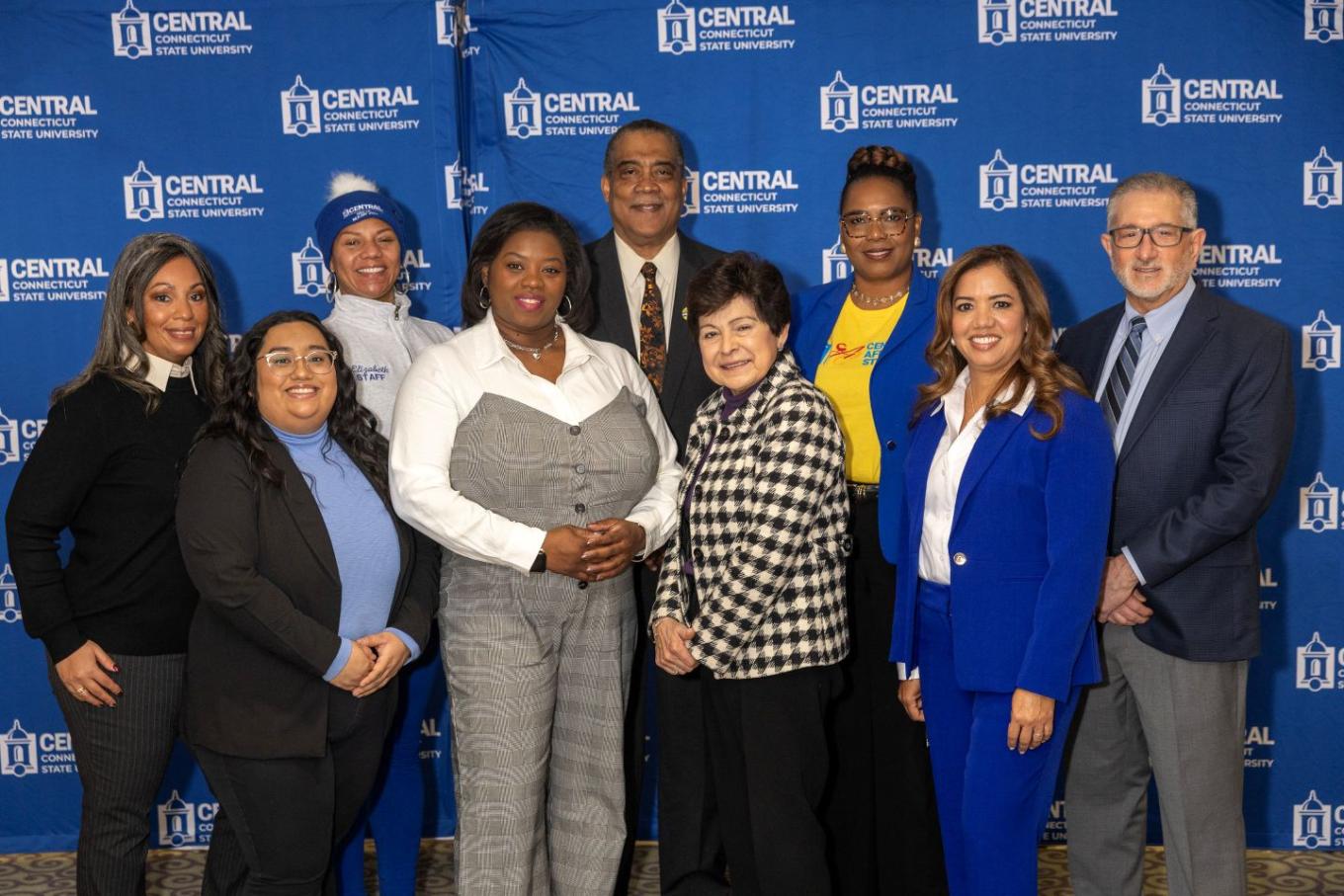 Members of the organizing committee pose for a group photo with keynote speaker L. Joy Williams