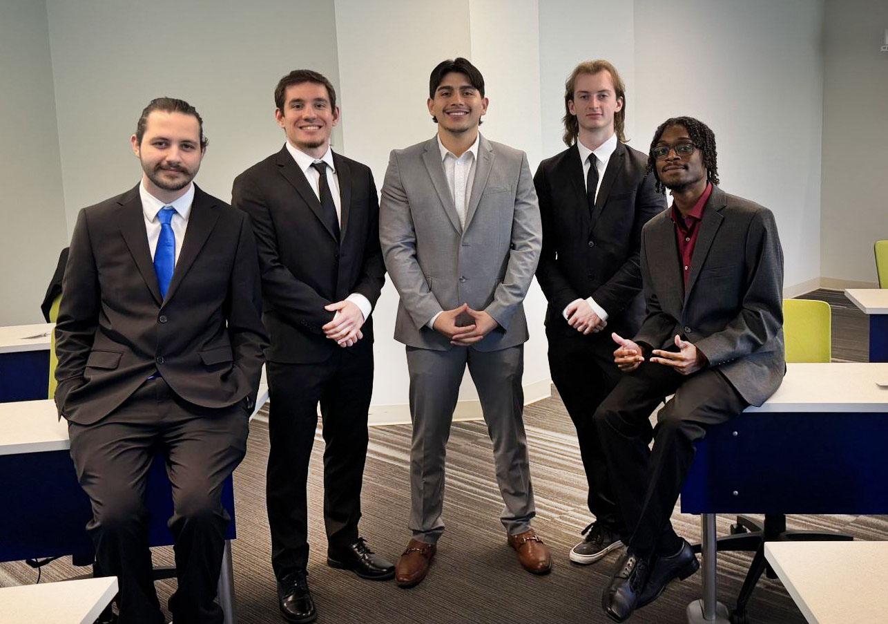 Team Central—comprised of Tyler Brown, John Legge, Jonathan Orlando, Gjin Rexhaj, and Luis Sebastian Sanchez—is shown here at on April 8 at the UConn School of Business during the Quantum Challenge UP competition.