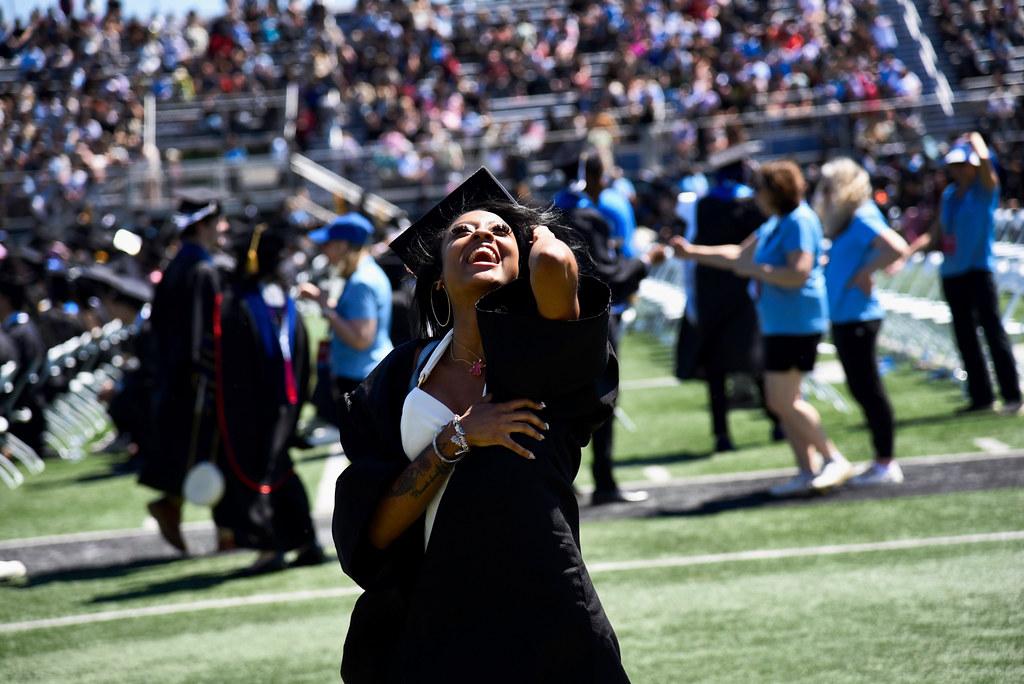 A graduate on the football field