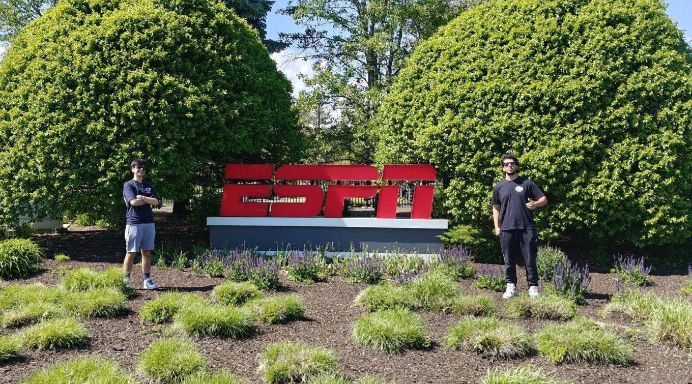 Exchange student Zakaria Butt poses with a classmate at ESPN headquarters.