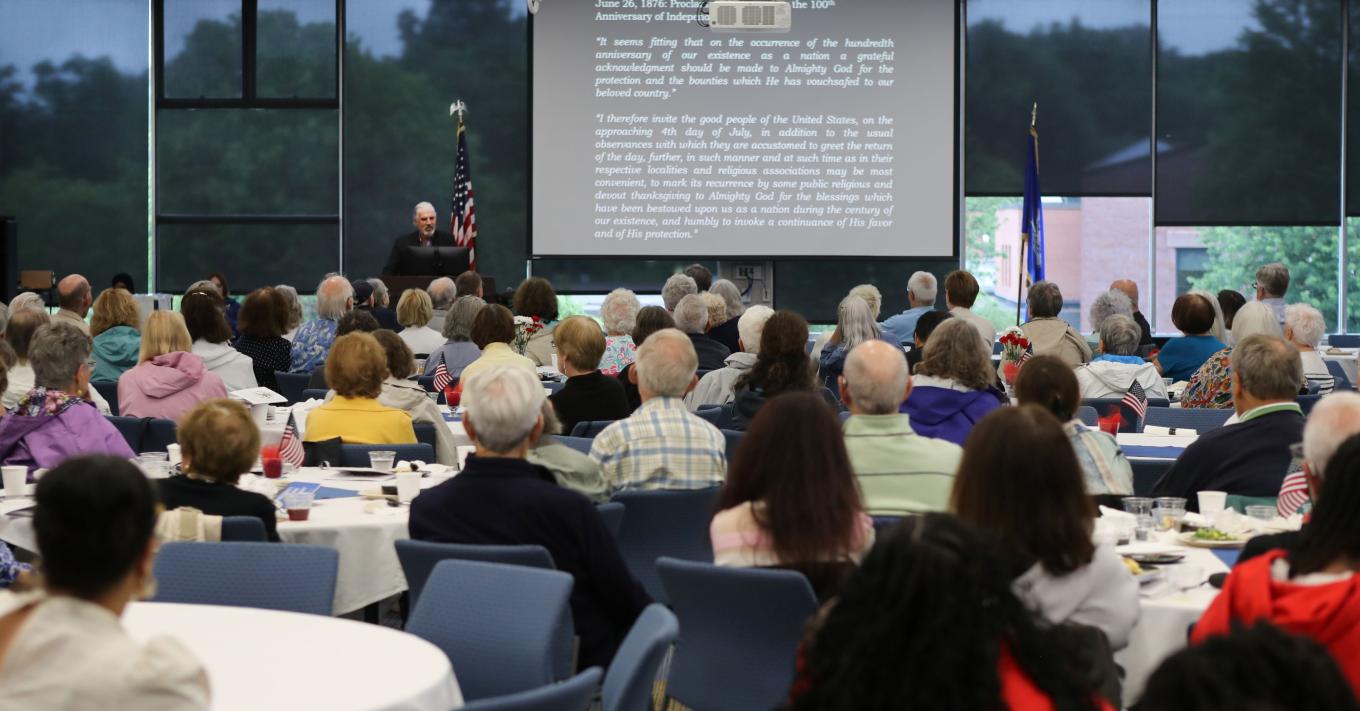 Matt Warhsauer presents a lecture on the American Revolution during a July 7 Scholars for Life event in Memorial Hall.