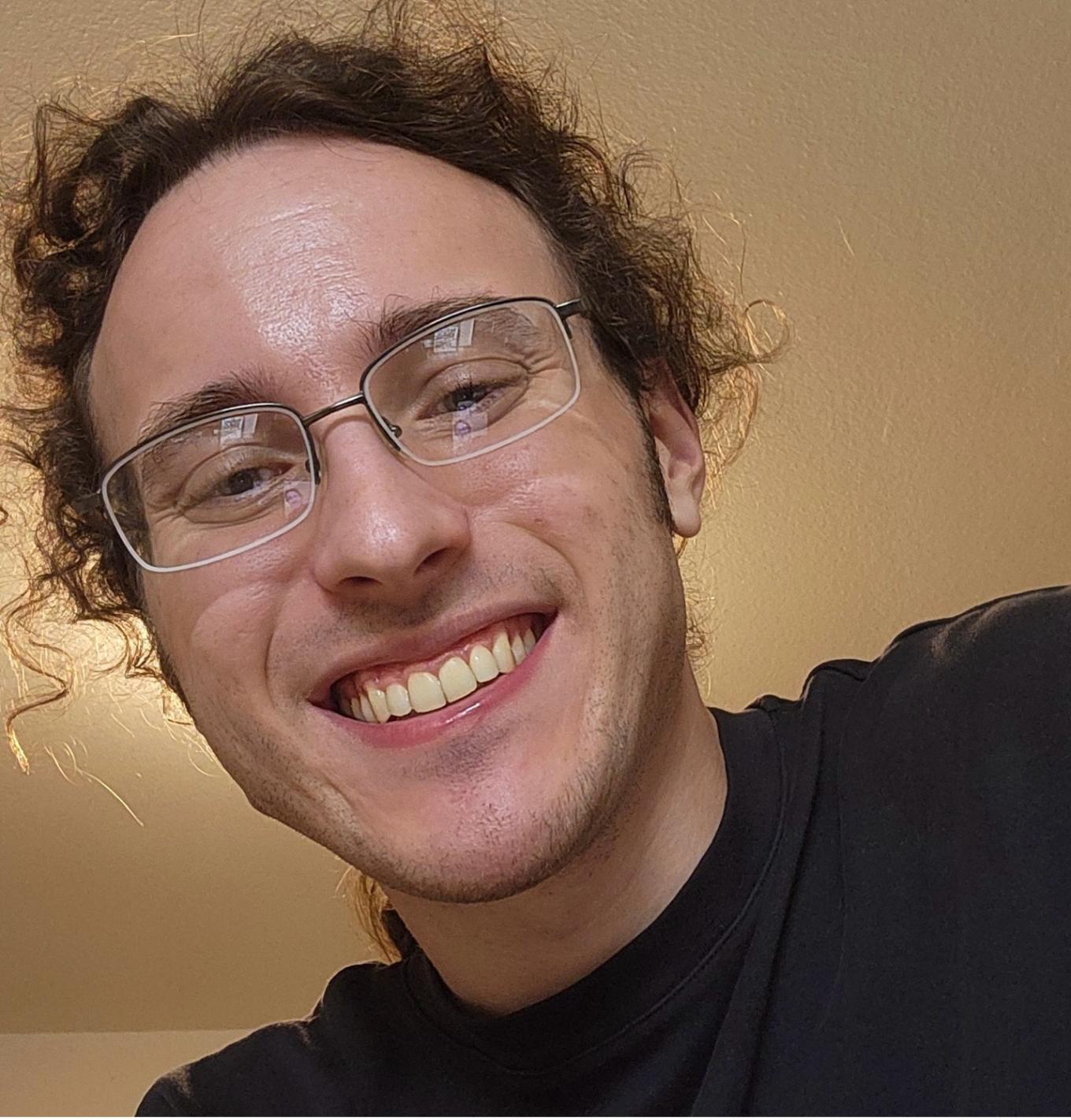 Headshot photo of Sam Loprete