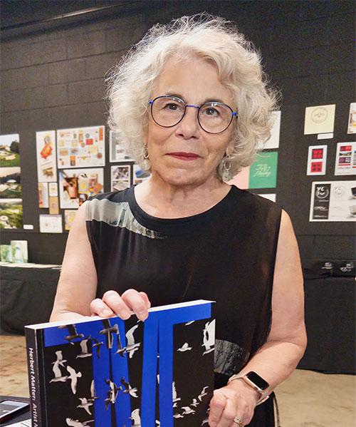 Jeanne Criscola with artwork 