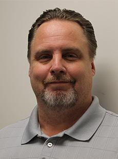 Headshot of E. Daniel Kirby.