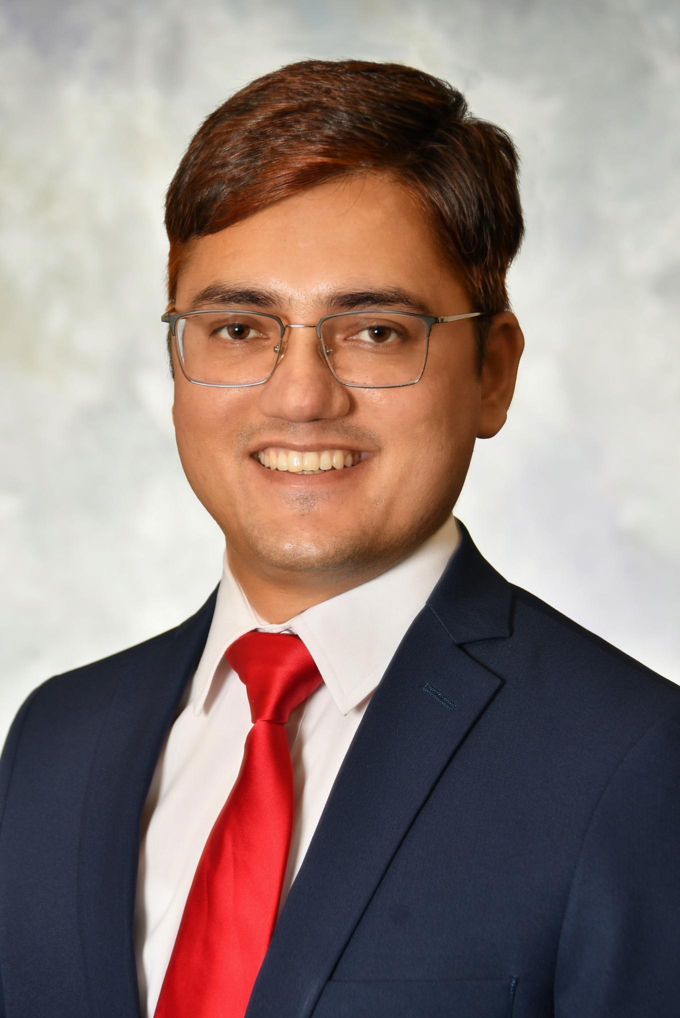 Headshot of Keshab Acharya.