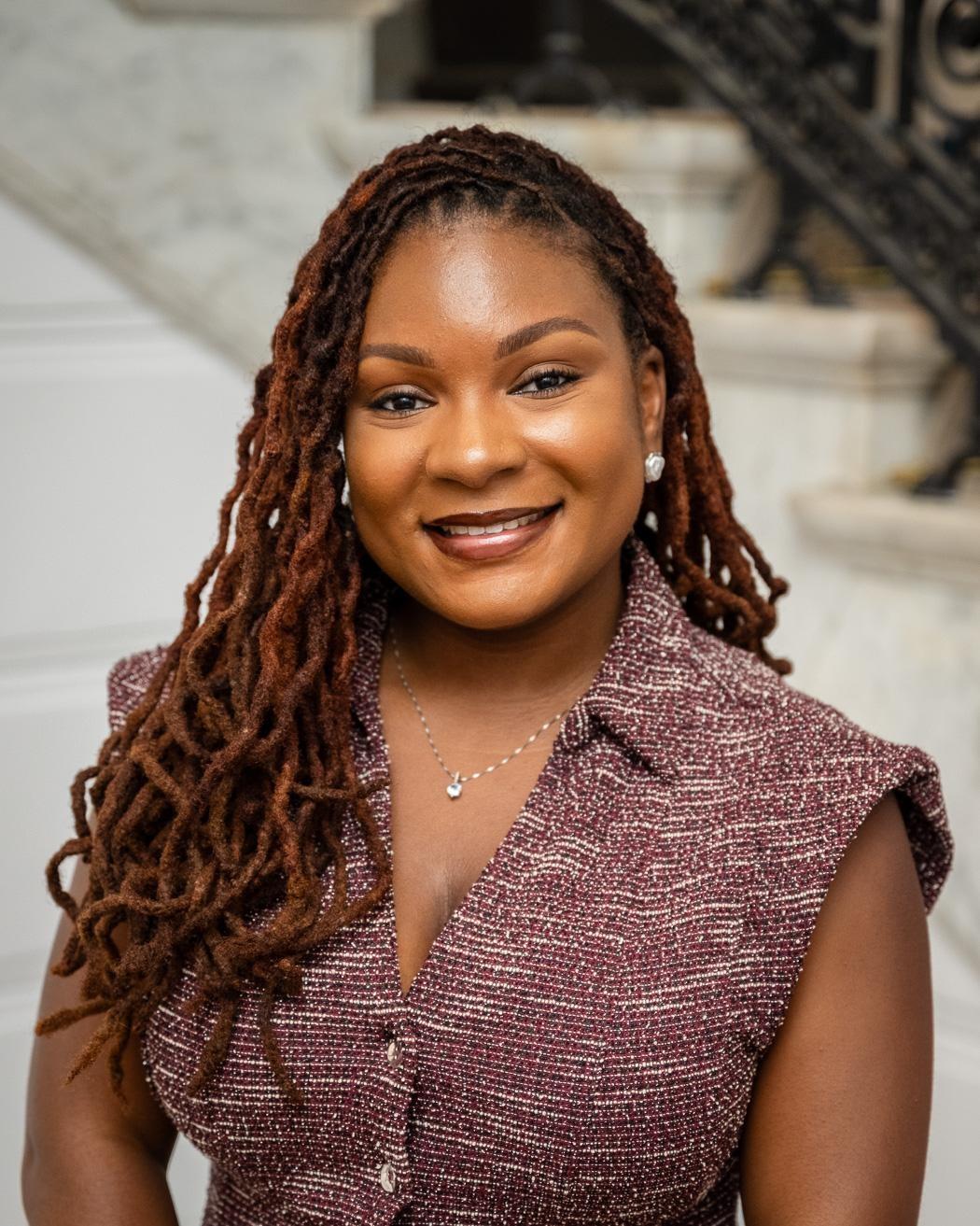 Headshot of Shanique Reid.
