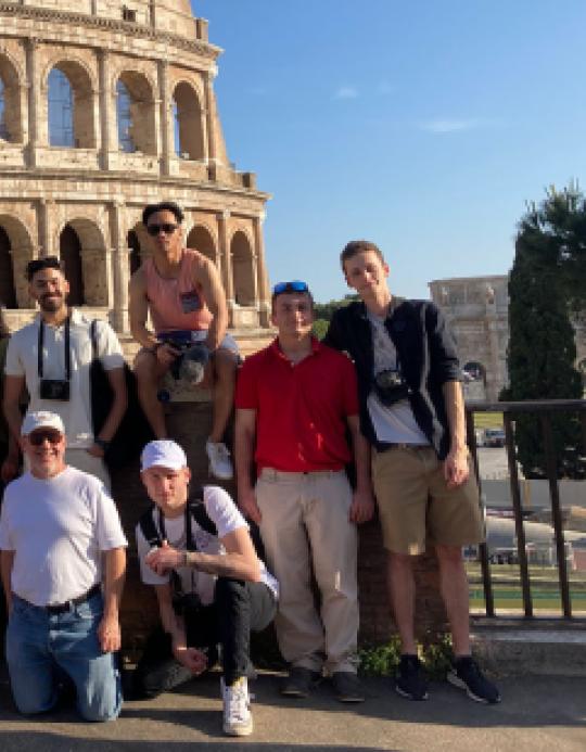 Class in front of the Roman Colosseum