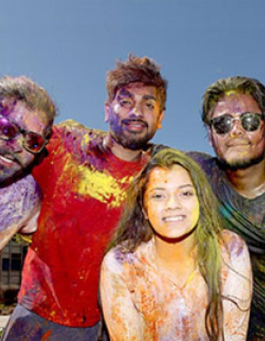 Students Covered in Colorful Splashes