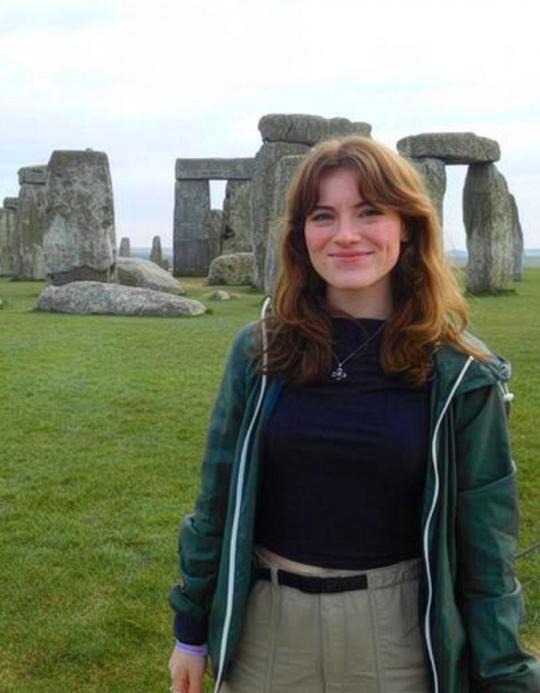student in front of Stonehenge
