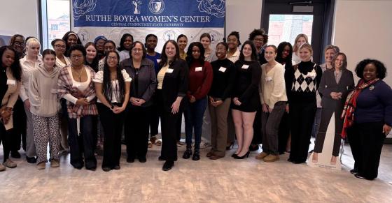 Students, faculty, and guest speakers take a group photo at the 2026 Elect Her training at Central.