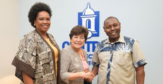 Oluwatoyin Awoderu, director of the Center for Africana Studies, President Zulma R. Toro, and Professor Peter Wanderi of Mount Kenya University pose for a group photo in Toro's office.