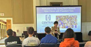 President Toro speaks to students at Monday's open forum.