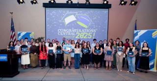Winners of the 2025 academic awards for outstanding scholarship and leadership on stage at Alumni Hall.