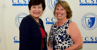 Distinguished Alumni Award winner Janet Nahorney ’83 with President Toro