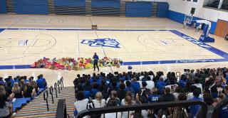 Tom Pincince addresses student-athletes at Kaiser Gym at Central