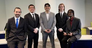 Team Central—comprised of Tyler Brown, John Legge, Jonathan Orlando, Gjin Rexhaj, and Luis Sebastian Sanchez—is shown here at on April 8 at the UConn School of Business during the Quantum Challenge UP competition.