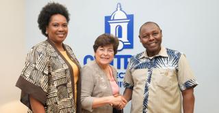 Oluwatoyin Awoderu, director of the Center for Africana Studies, President Zulma R. Toro, and Professor Peter Wanderi of Mount Kenya University pose for a group photo in Toro's office.