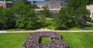 First-year students form the letter C on Vance lawn.